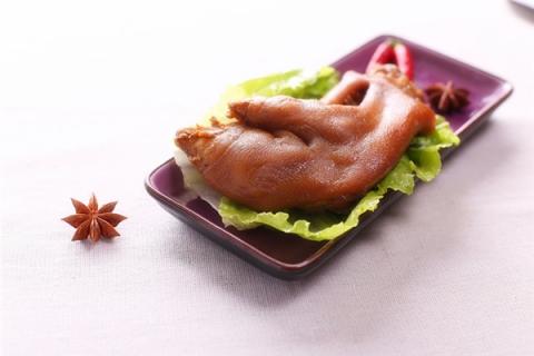 梦见已故的人吃猪脚怎么说